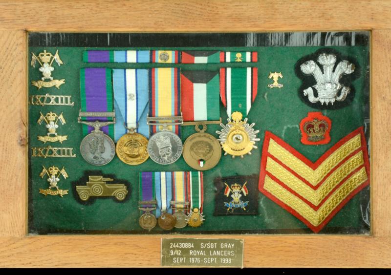 9/12th LANCERS, NORTHERN IRELAND & 1991 GULF GROUP, IN A PRESENTATION CASE WITH BADGES & OTHER ITEMS