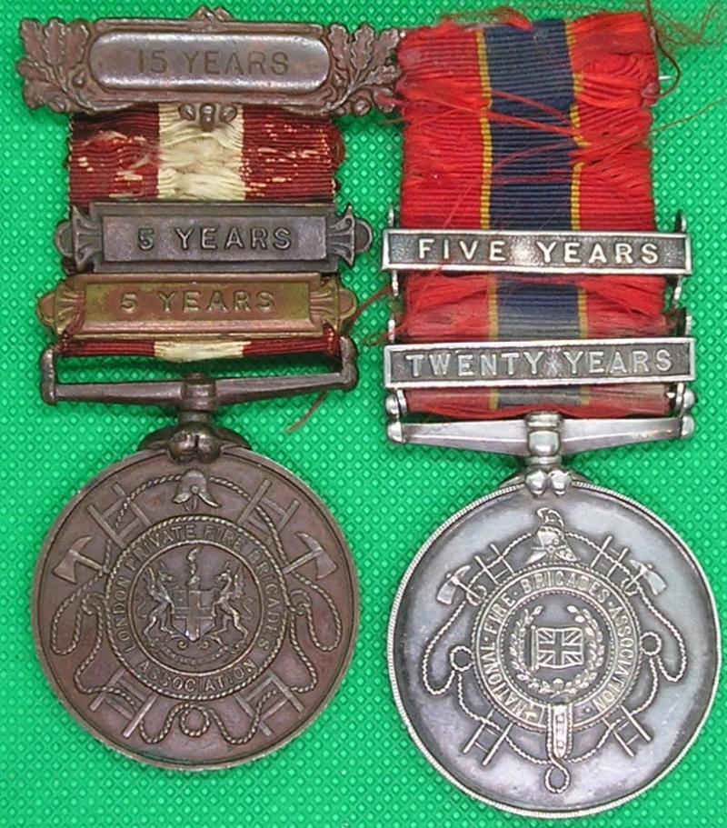 A PAIR OF FIRE BRIGADE ASSOCATION LONG SERVICE MEDALS TO A LONDON FIREMAN