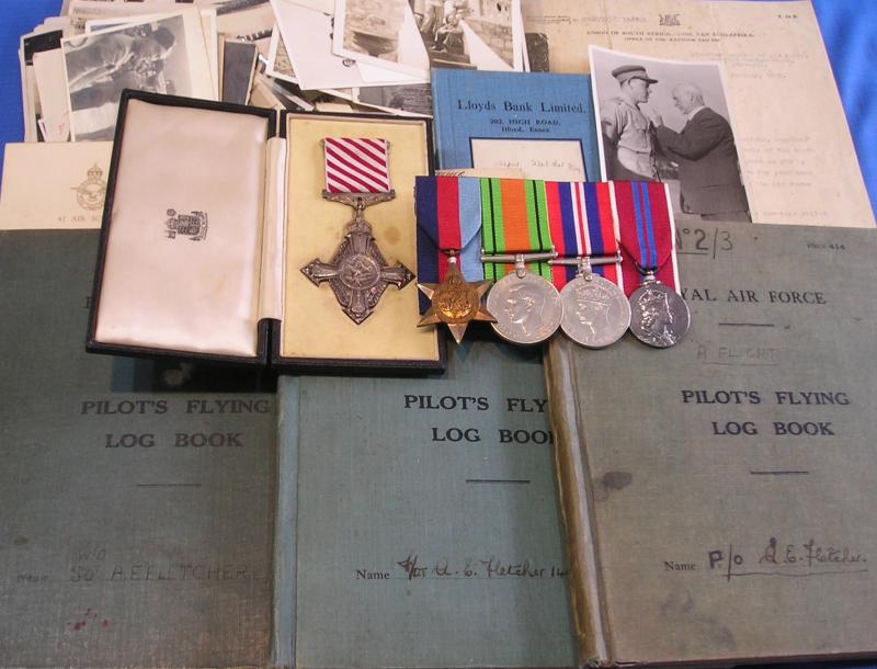 WW2 AIR FORCE CROSS GROUP, WITH THREE LOG BOOKS & A VAST ARCHIVE OF PHOTOS & DOCUMENTS, PILOT NO-42 AIR SCHOOL, PORT ELIZABETH.