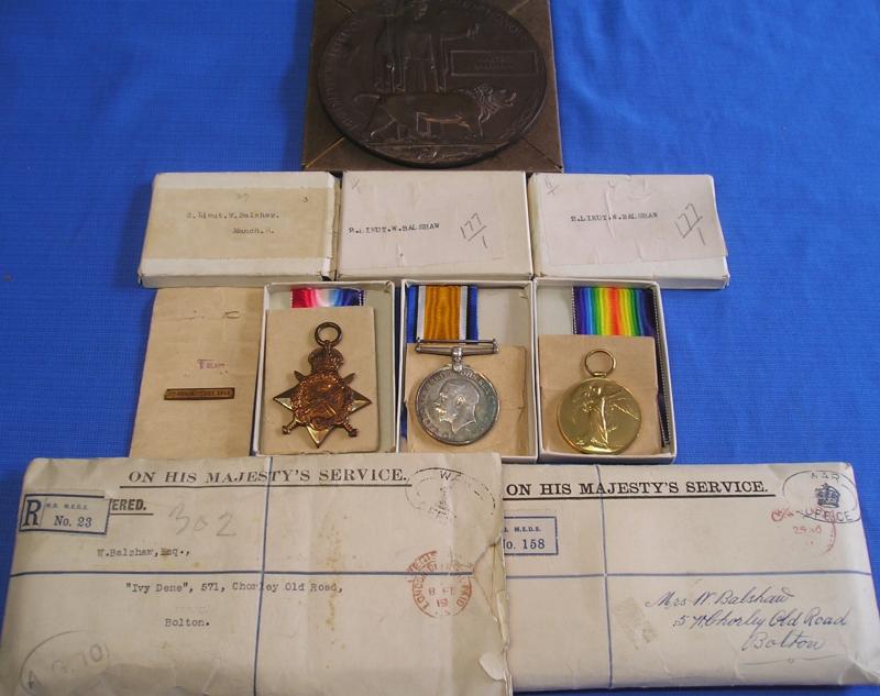 MINT BOXED, WW1 1914 MONS STAR & BAR TRIO WITH MEMORIAL PLAQUE, OFFICER 2nd MANCHESTER REGIMENT, K.I.A F&F 20-10-1914, FROM BOLTON